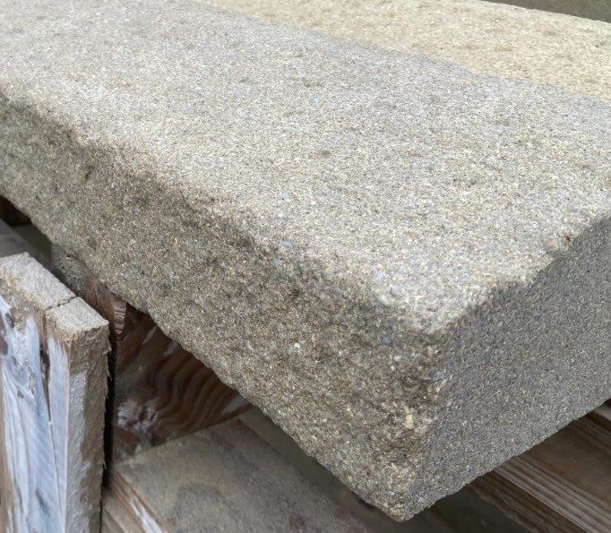 Close detail of natural gritstone beam colour and character