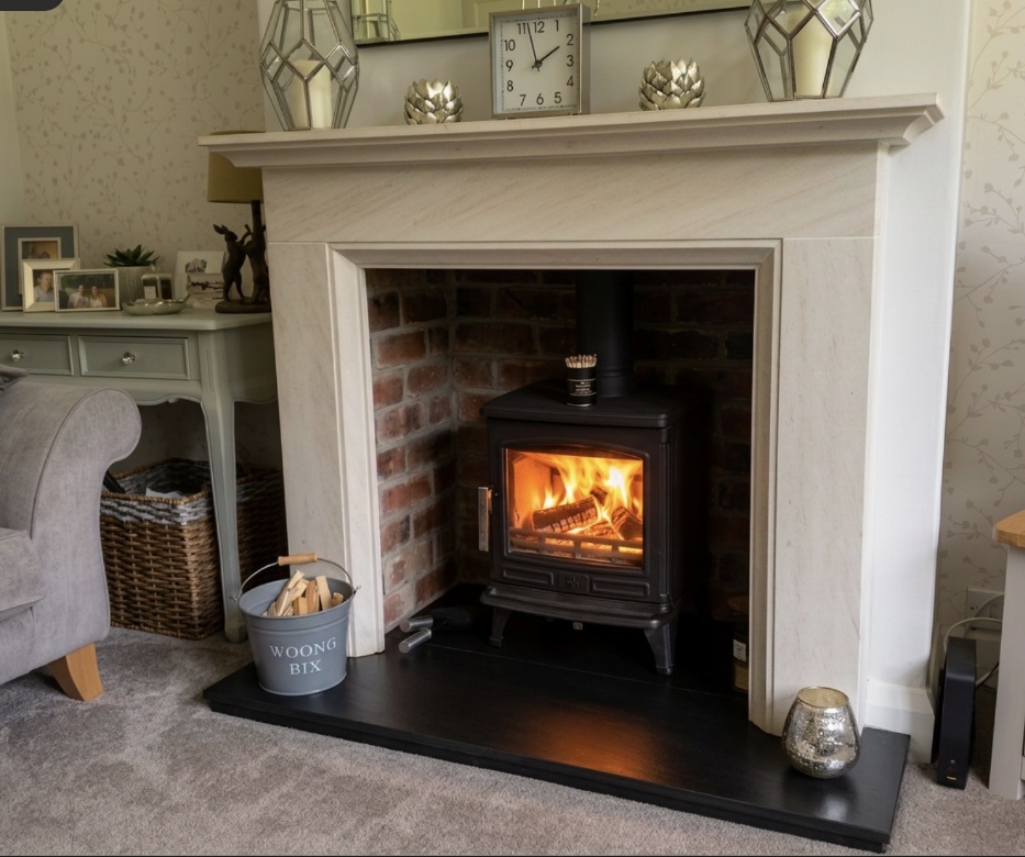 ACR Oakdale multifuel stove in a Durham limestone fireplace in Pocklington