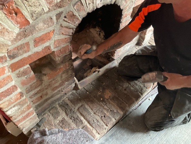 Fitting the new components into the brick chamber.