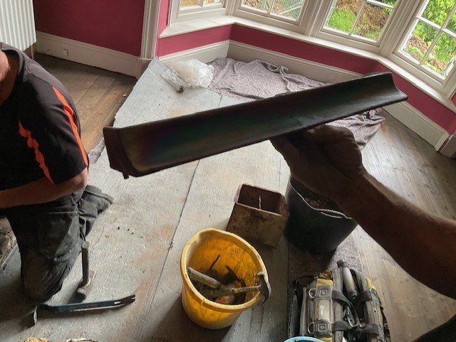 The throat lintel going into place.