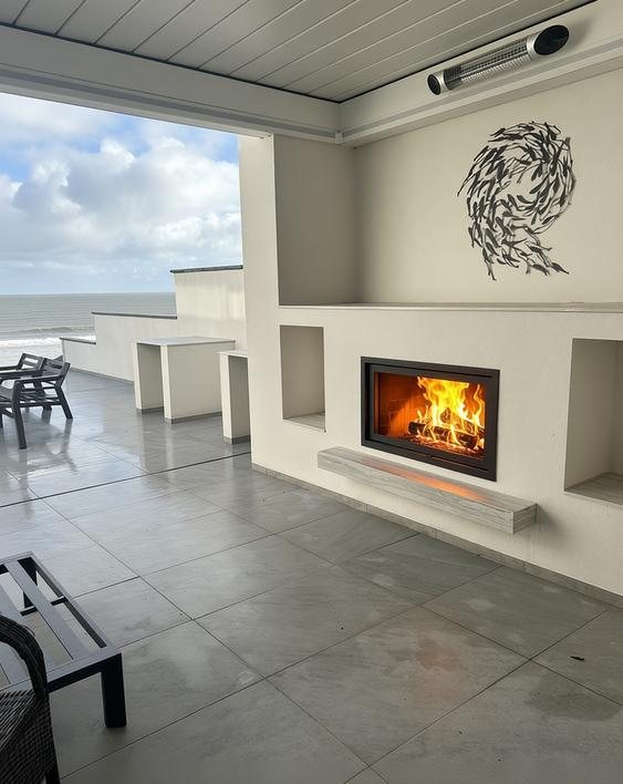 Dik Geurts Instyle 1000 wood burning fire with Dekton surround in an Art Deco home in Filey