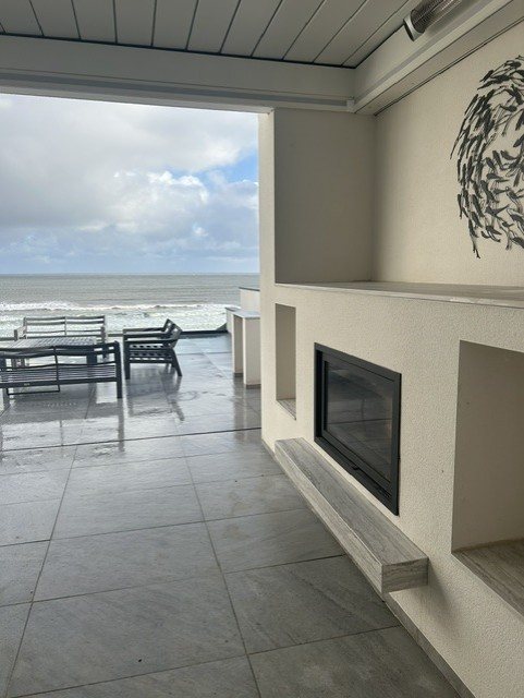 Dik Geurts built-in wood fire with Dekton surround in Filey
