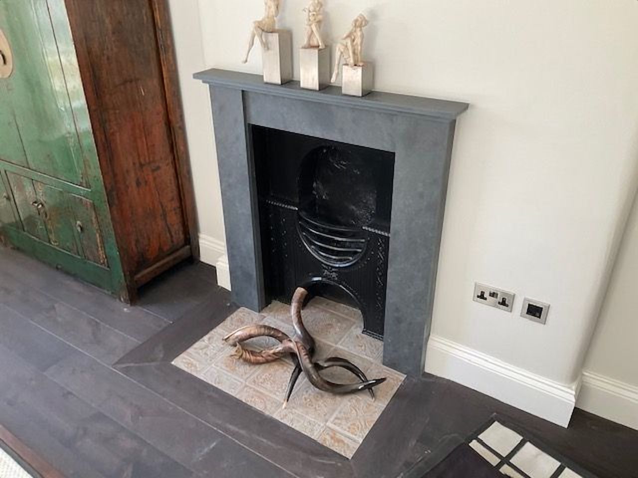 After: the handcrafted slate surround around the original Victorian cast hob grate