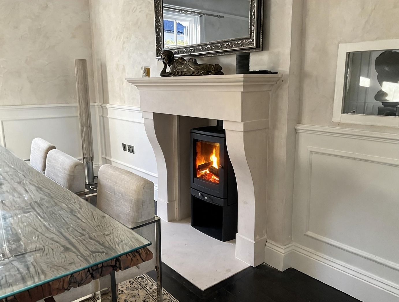 After: the Province limestone fireplace, finished in Scala limestone throughout