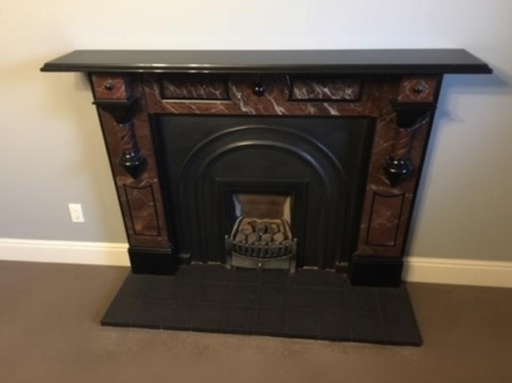 Before: the painted slate surround with the original gas fire and reproduction cast iron insert.