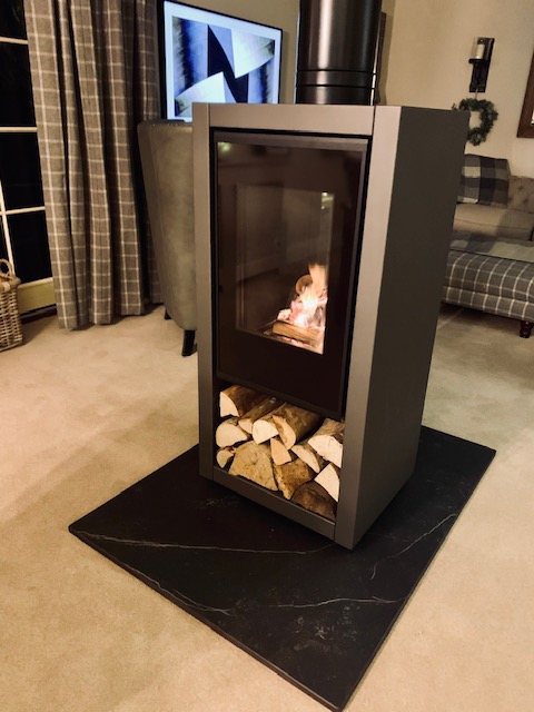 Spartherm A8 tunnel stove on a precision-cut Dekton hearth, fitted by Carl Finnell in Helmsley