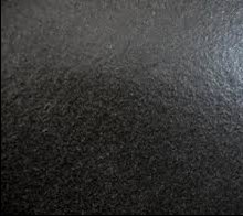 Close-up of the Antique Leather matt black granite textured finish