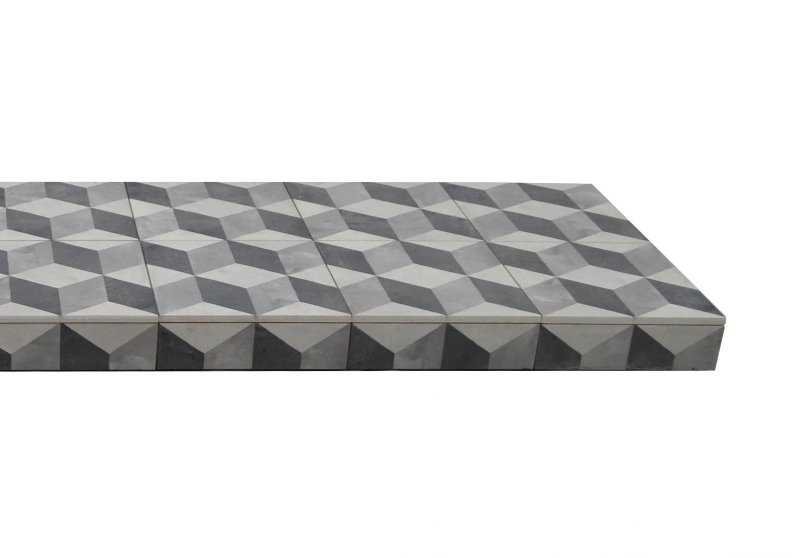 Geometric cubist tiled hearth with a three-dimensional patterned tile design