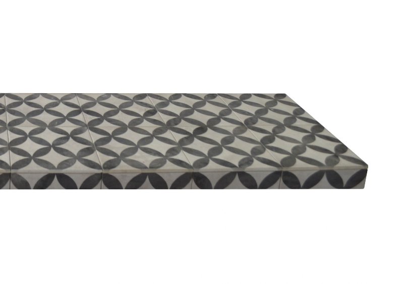 A mosaic tiled hearth