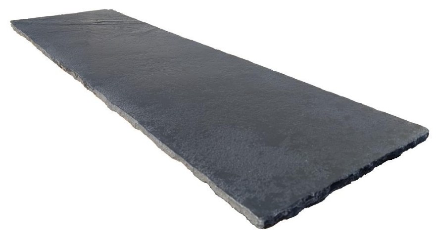An Old Mill aged black limestone hearth in deep charcoal tones