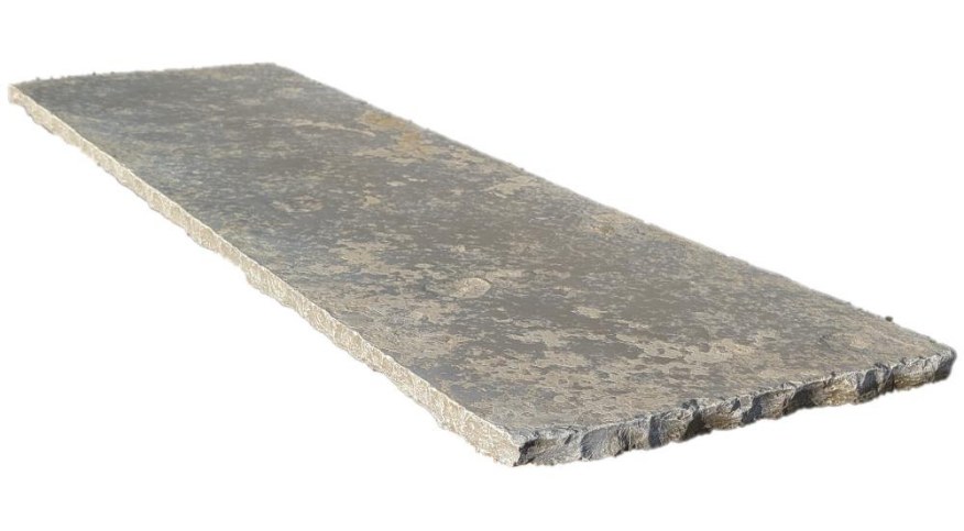 An aged olive limestone hearth