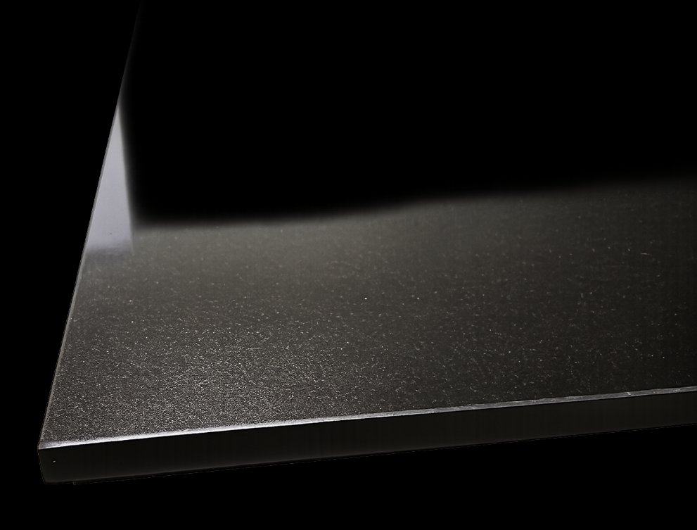 A polished black granite hearth