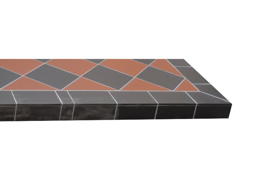 A red and black quarry tiled hearth