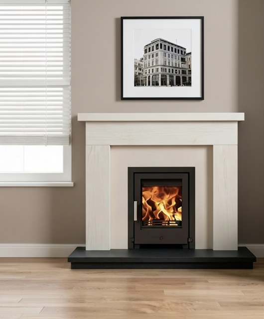 A Byland natural limestone fireplace package with an ACR T400 cassette stove